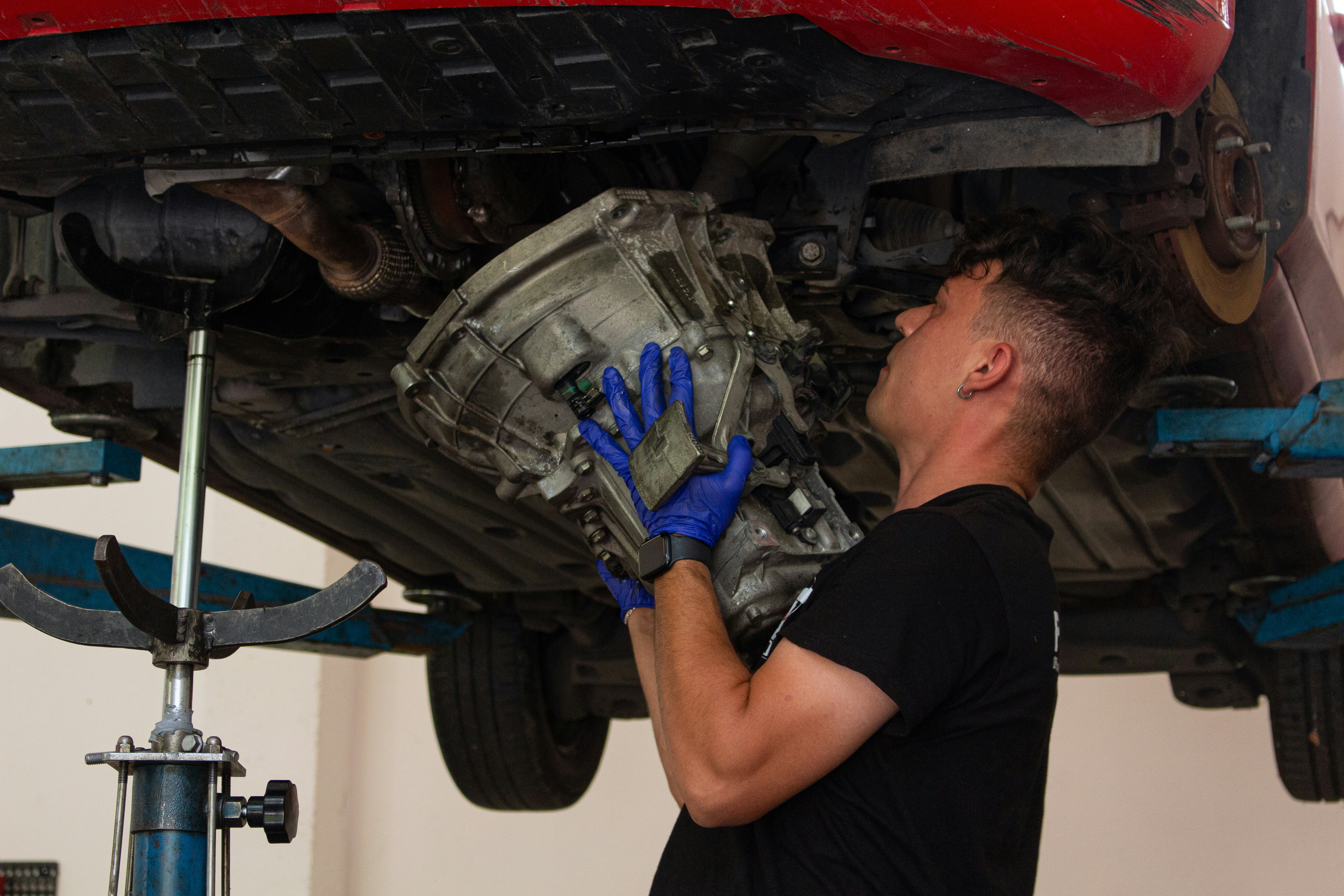 Technician rebuilding a transmission